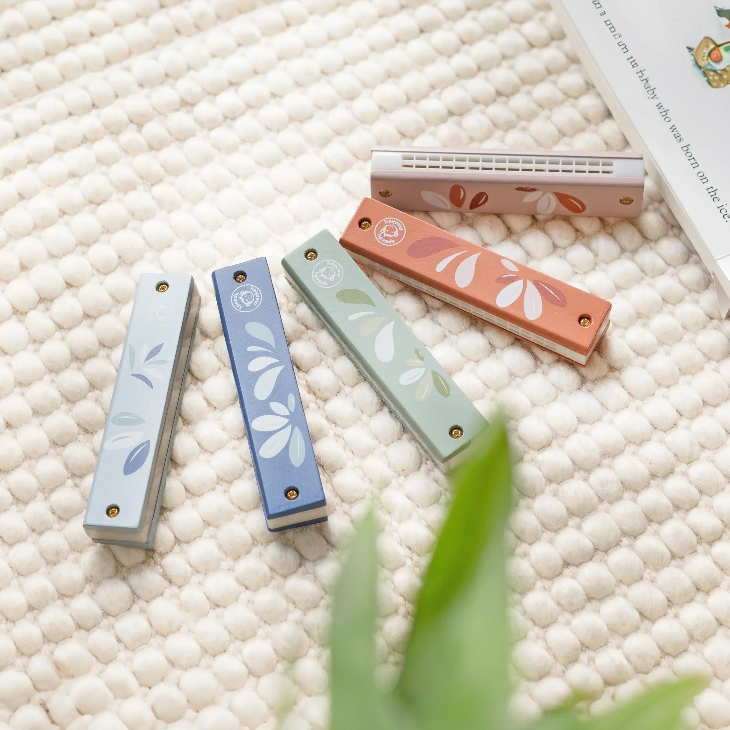 Display of 10 assorted Harmonicas